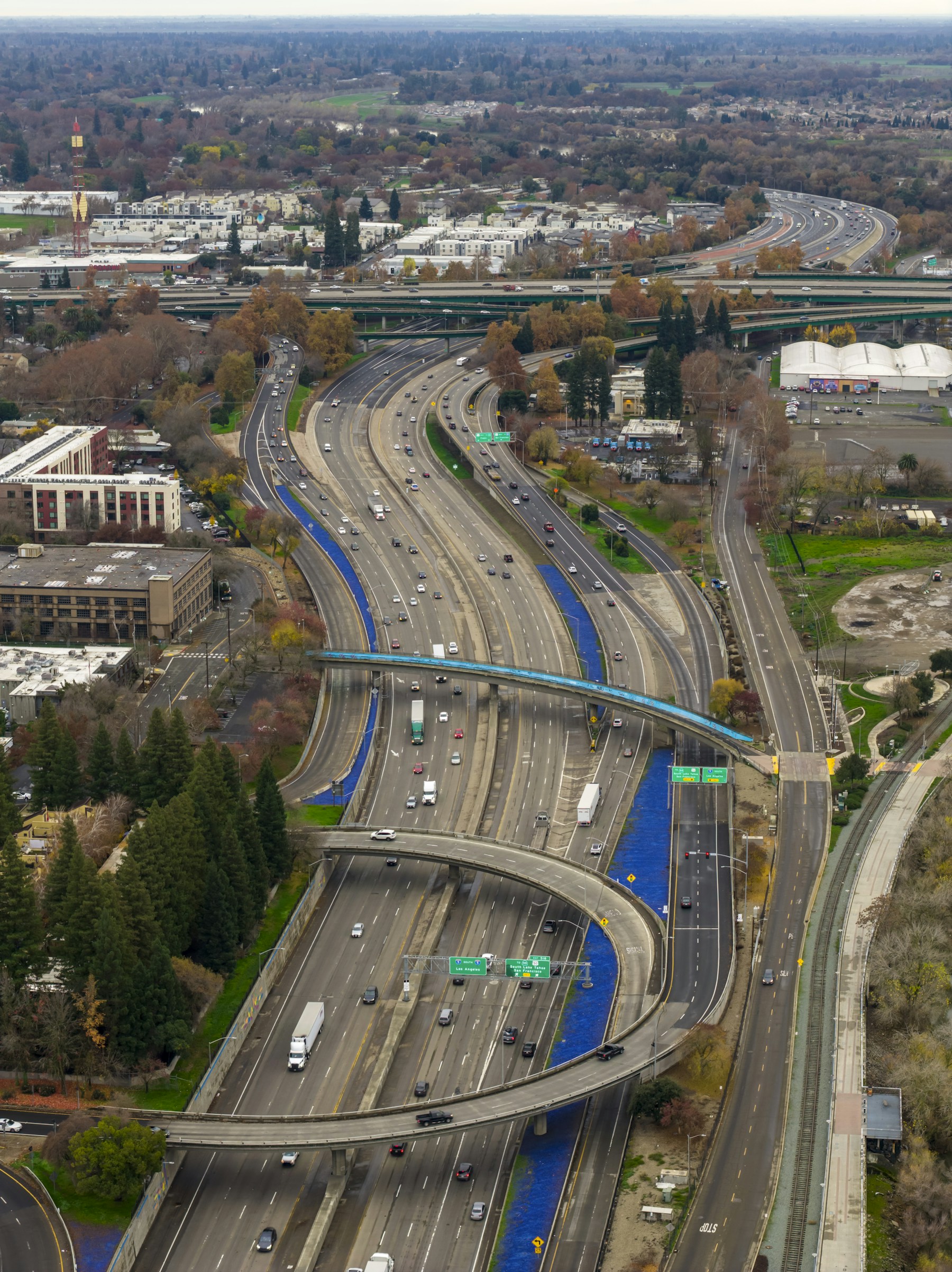 Aerial view of a busy highway interchange carrying streams of traffic