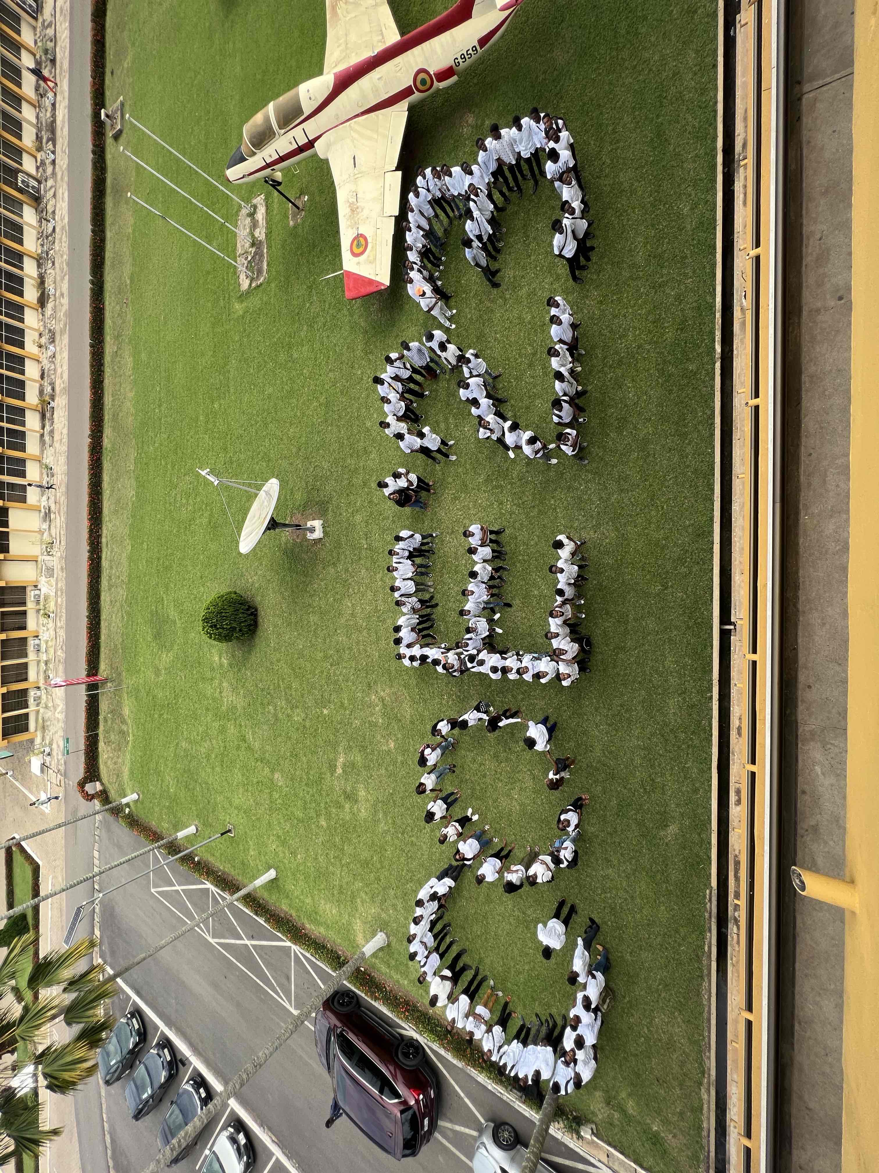 Final Year Picture - A picture of a group of students forming the word C O E '23