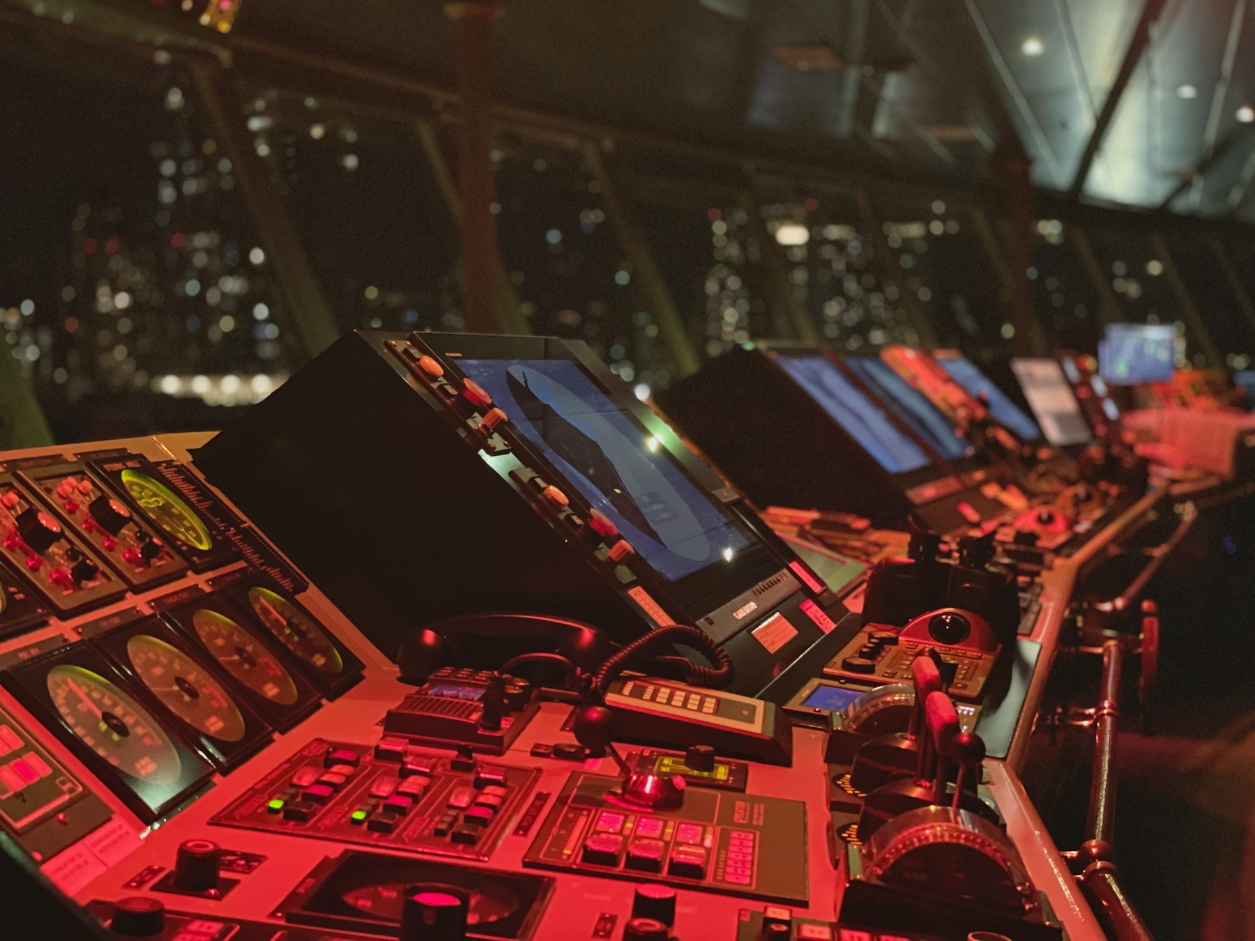 A control room console used to monitor and steer a complex system